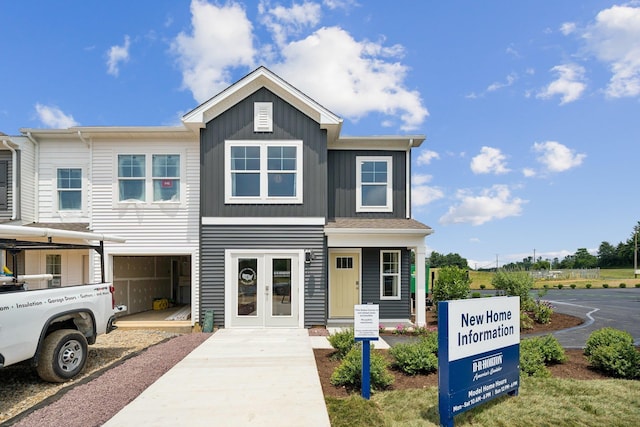 240 Camden Dr, Waynesboro, VA 22980 - view of front facade with board and batten siding, driveway, and french doors