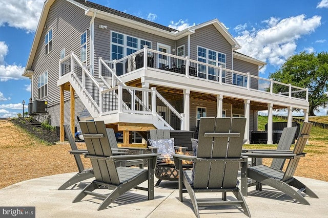 330 Rock Island Rdg, Mineral, VA 23117 - rear view of property with a fire pit, stairway, a patio, and a wooden deck