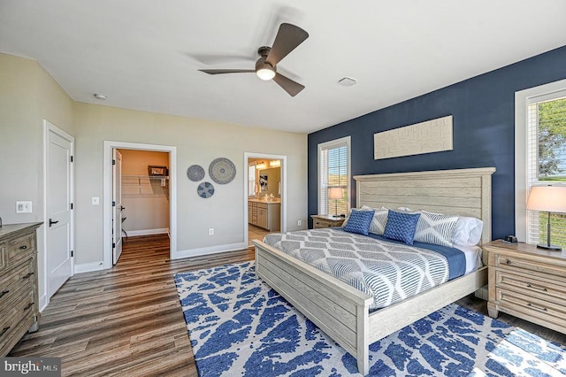 330 Rock Island Rdg, Mineral, VA 23117 - bedroom with wood finished floors, baseboards, a spacious closet, ceiling fan, and connected bathroom