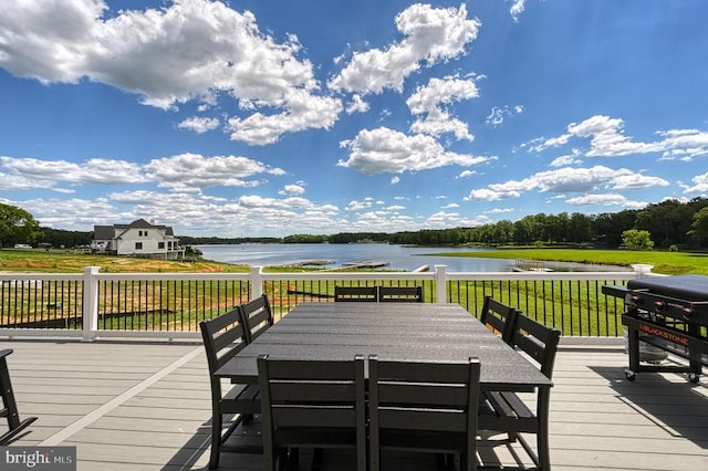 330 Rock Island Rdg, Mineral, VA 23117 - deck featuring a water view, outdoor dining area, a yard, and a grill