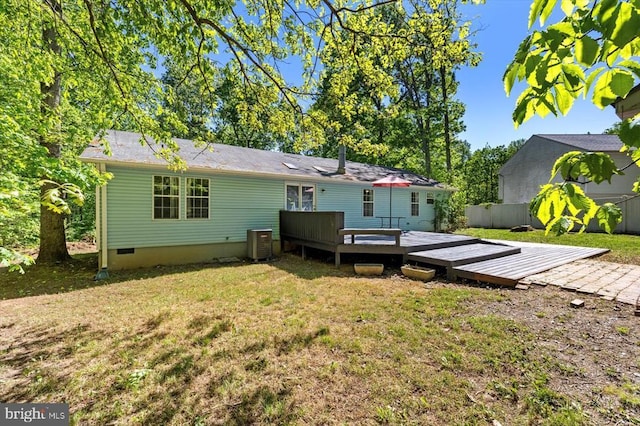 13602 Flank March Ln, Spotsylvania, VA 22551 - back of house with a yard, a deck, central AC, and crawl space
