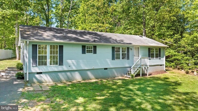 13602 Flank March Ln, Spotsylvania, VA 22551 - view of front of property with a front lawn, crawl space, fence, and roof with shingles