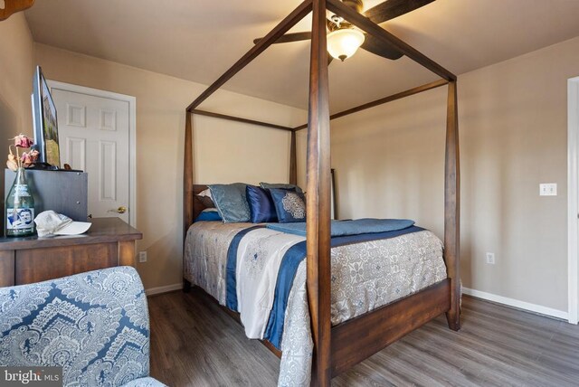 5585 Sperryville Pike, Boston, VA 22713 - bedroom with wood finished floors, baseboards, and a ceiling fan