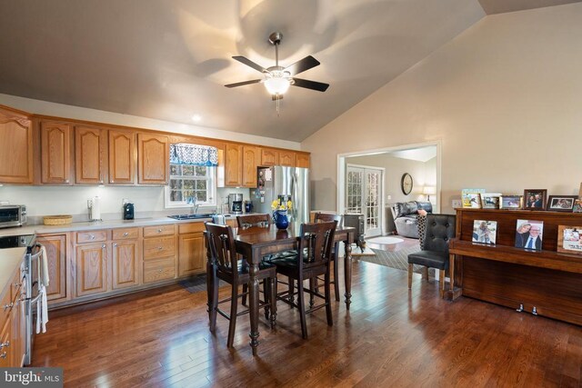 5585 Sperryville Pike, Boston, VA 22713 - dining area featuring ceiling fan, dark wood-style flooring, and high vaulted ceiling