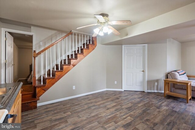 5585 Sperryville Pike, Boston, VA 22713 - basement with dark wood finished floors, a ceiling fan, baseboards, and stairway