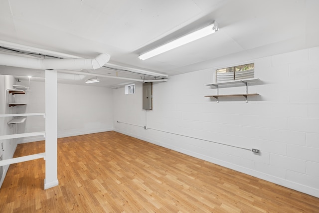 2403 Bare St, Staunton, VA 24401 - below grade area featuring electric panel, light wood-style flooring, and concrete block wall
