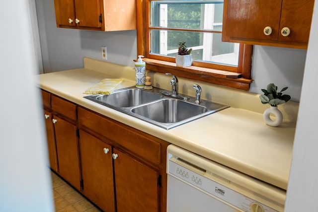 2403 Bare St, Staunton, VA 24401 - kitchen featuring white dishwasher, light countertops, brown cabinets, and light tile patterned flooring