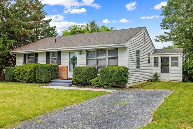 2403 Bare St, Staunton, VA 24401 - single story home featuring a front yard, roof with shingles, and a sunroom