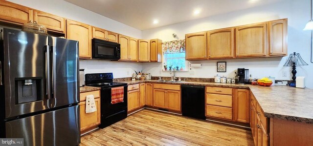 1884 Kennon Rd, Mineral, VA 23117 - kitchen with black appliances, light wood finished floors, recessed lighting, and dark countertops