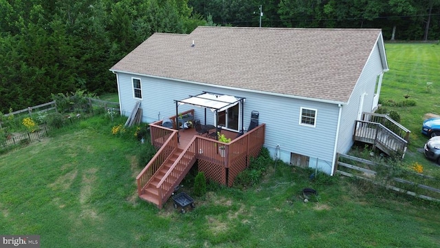 1884 Kennon Rd, Mineral, VA 23117 - back of house with stairway, a wooden deck, a forest view, and a shingled roof