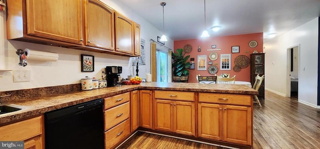 1884 Kennon Rd, Mineral, VA 23117 - kitchen featuring dishwasher, a peninsula, dark wood-type flooring, and brown cabinets