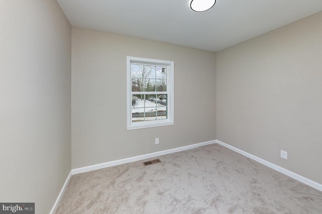 view of carpeted spare room