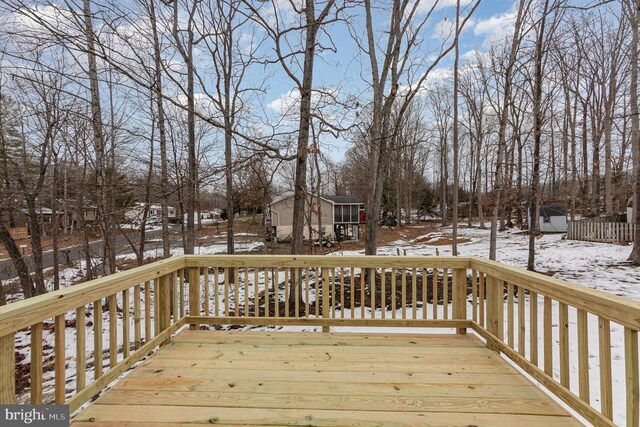 view of snow covered deck