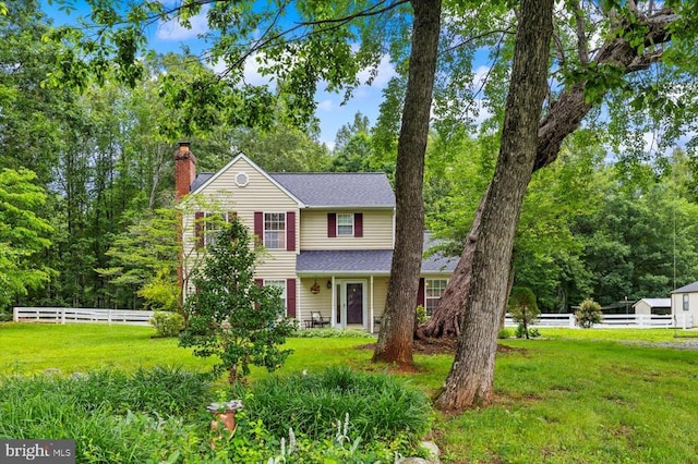 319 Fox Hunters Ln, Madison, VA 22727 - traditional home featuring a chimney and roof with shingles