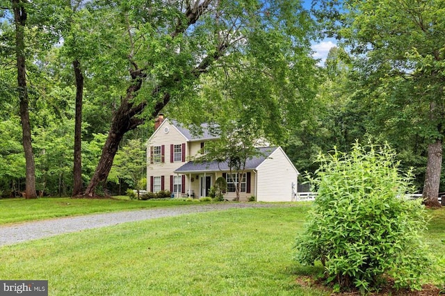 319 Fox Hunters Ln, Madison, VA 22727 - view of front facade with a front yard, gravel driveway, and a chimney