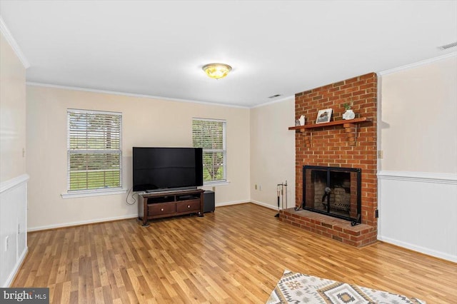 319 Fox Hunters Ln, Madison, VA 22727 - unfurnished living room featuring wood finished floors, ornamental molding, and a brick fireplace
