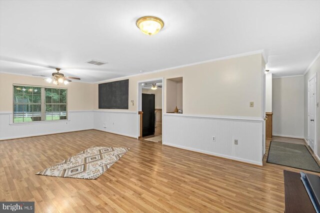 319 Fox Hunters Ln, Madison, VA 22727 - empty room with ceiling fan, ornamental molding, wood finished floors, and wainscoting