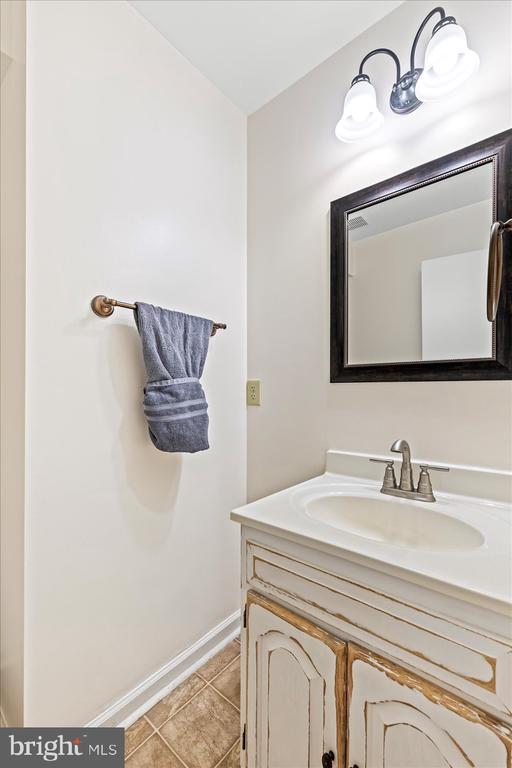 319 Fox Hunters Ln, Madison, VA 22727 - bathroom with vanity and tile patterned flooring