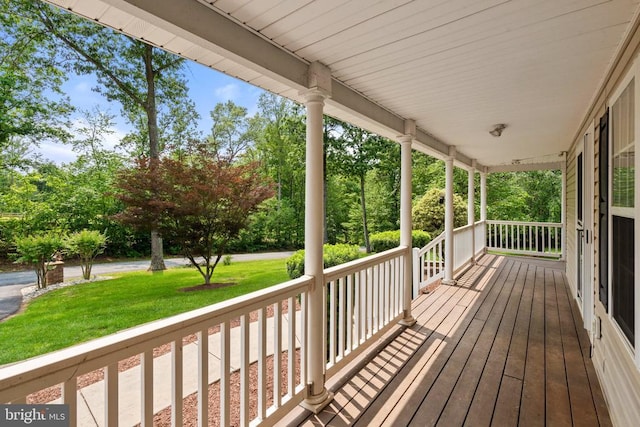 7221 Crockett Ave, Rapidan, VA 22733 - porch featuring a yard and view of wooded area