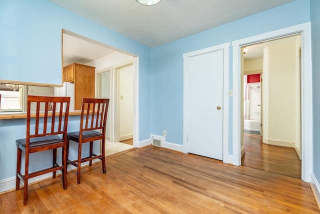 340 New York Ave, Harrisonburg, VA 22801 - dining area featuring light wood-style floors and baseboards