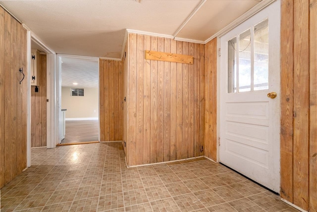 340 New York Ave, Harrisonburg, VA 22801 - entryway with wood walls, crown molding, and tile patterned floors