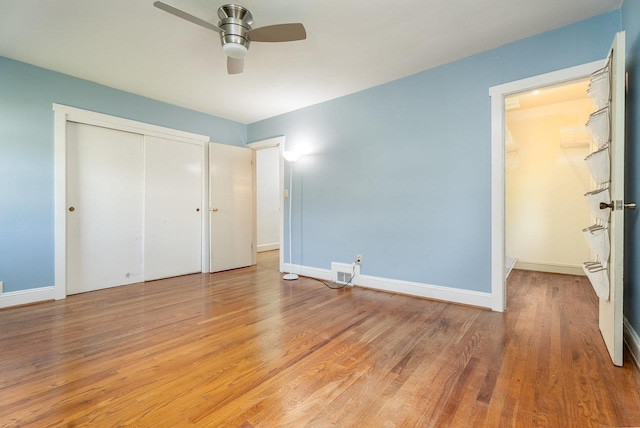340 New York Ave, Harrisonburg, VA 22801 - unfurnished bedroom with light wood-style flooring, a closet, and ceiling fan