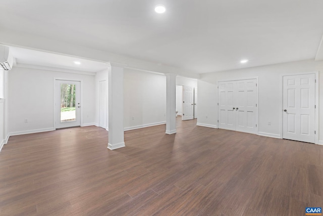 102 Powhatan Cir, Charlottesville, VA 22901 - unfurnished living room featuring recessed lighting, baseboards, dark wood-style flooring, and a wall unit AC