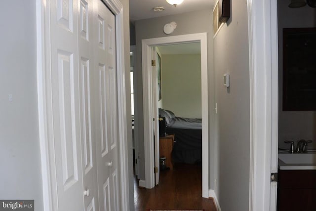 229 Dover Rd, Warrenton, VA 20186 - hallway featuring a sink and dark wood-type flooring