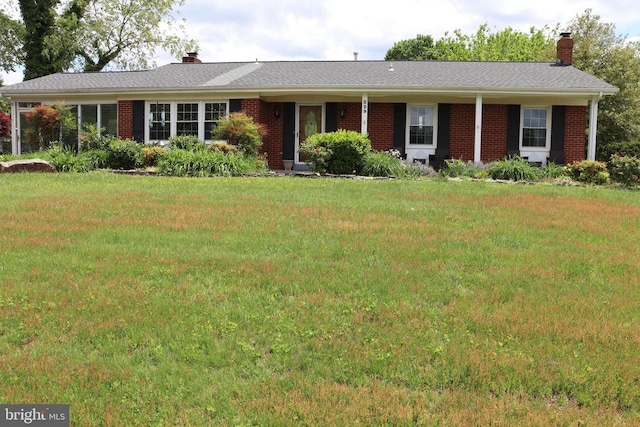 229 Dover Rd, Warrenton, VA 20186 - single story home with a chimney, brick siding, and a front yard