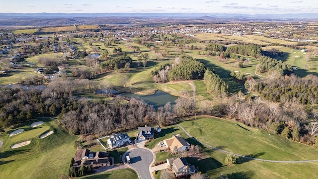aerial view featuring a water view, a residential view, and view of golf course