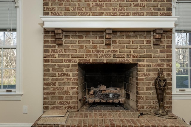interior details featuring a fireplace