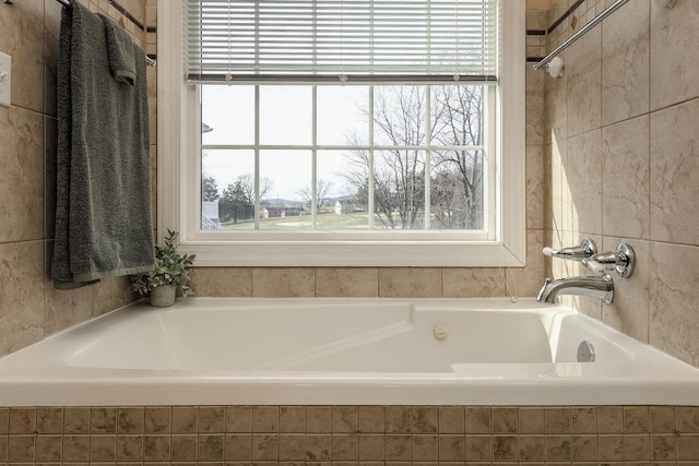 full bath featuring a tub