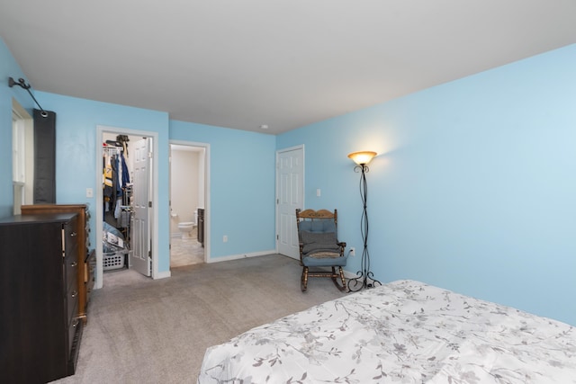 10 Zephyr Rd, Palmyra, VA 22963 - carpeted bedroom featuring a closet, baseboards, a walk in closet, and ensuite bathroom