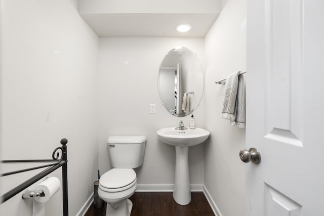 10 Zephyr Rd, Palmyra, VA 22963 - bathroom with toilet, baseboards, wood finished floors, and a sink