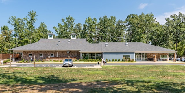 10 Zephyr Rd, Palmyra, VA 22963 - back of house featuring a lawn and stone siding