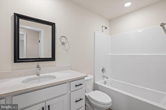 full bathroom with vanity, toilet, tub / shower combination, and recessed lighting