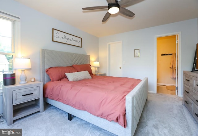 769 Cherry Tree Ln, Warrenton, VA 20186 - bedroom with light carpet, ensuite bath, and a ceiling fan