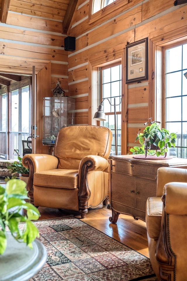 945 Neese Ln, New Market, VA 22844 - sitting room with wooden walls, wood ceiling, vaulted ceiling with beams, and wood finished floors