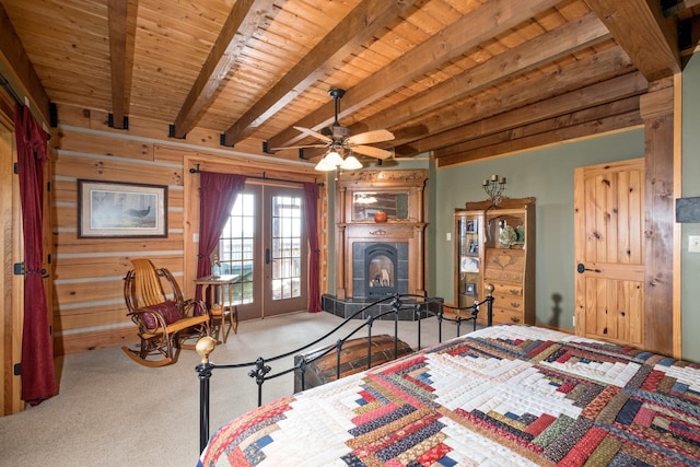 945 Neese Ln, New Market, VA 22844 - carpeted bedroom featuring french doors, beam ceiling, wooden ceiling, access to outside, and a tile fireplace