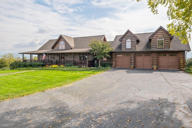 945 Neese Ln, New Market, VA 22844 - view of front of house with driveway, covered porch, a garage, a front yard, and roof with shingles