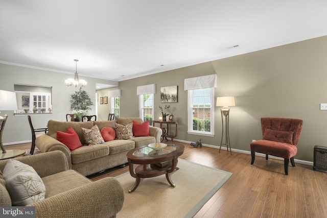 12006 Meadow Branch Way, Fredericksburg, VA 22407 - living area with a chandelier, crown molding, and wood finished floors