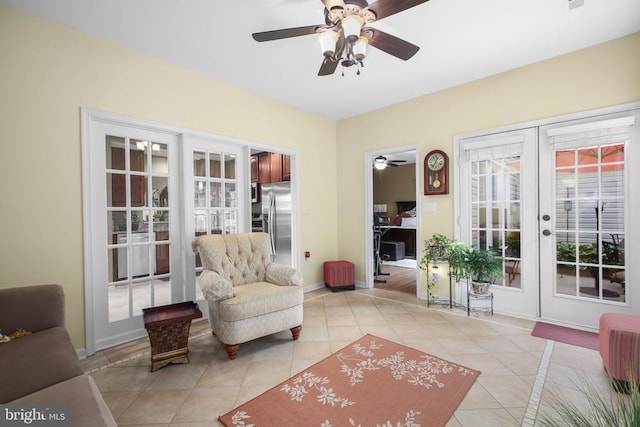 12006 Meadow Branch Way, Fredericksburg, VA 22407 - living area with french doors, a ceiling fan, and tile patterned floors