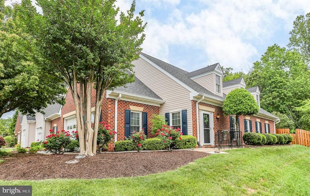 12006 Meadow Branch Way, Fredericksburg, VA 22407 - view of front of property with an attached garage, brick siding, and a shingled roof