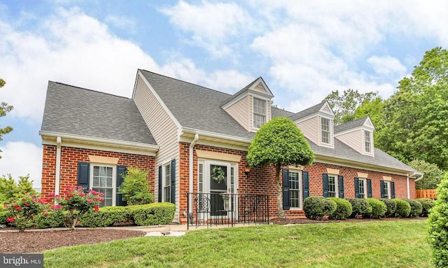 12006 Meadow Branch Way, Fredericksburg, VA 22407 - cape cod home featuring brick siding, a front yard, and roof with shingles