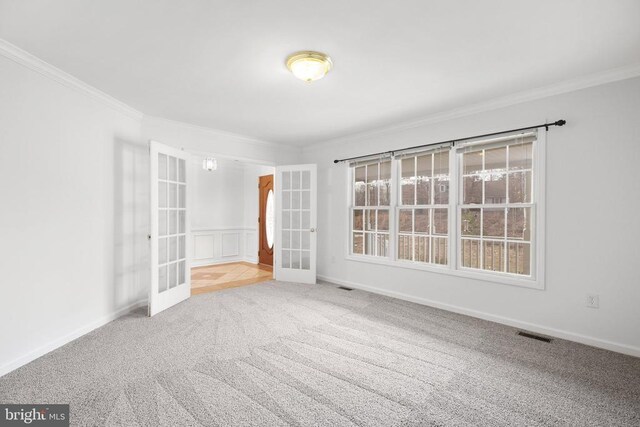 5519 Bazzanella Dr, Mineral, VA 23117 - unfurnished room with french doors, crown molding, carpet floors, and baseboards