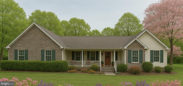 5519 Bazzanella Dr, Mineral, VA 23117 - ranch-style house featuring stone siding, a porch, and a front yard
