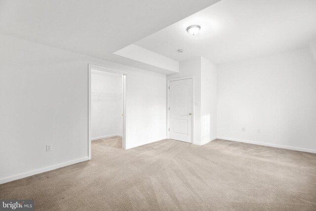 5519 Bazzanella Dr, Mineral, VA 23117 - unfurnished bedroom featuring carpet flooring, baseboards, a walk in closet, and a closet