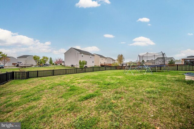 2245 Walnut Branch Dr, Culpeper, VA 22701 - view of yard with a trampoline and a residential view