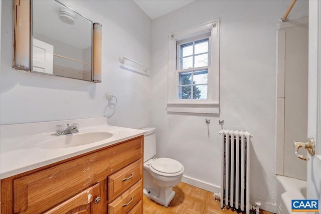 2420 James River Rd, Esmont, VA 22937 - bathroom with toilet, radiator, baseboards, and vanity