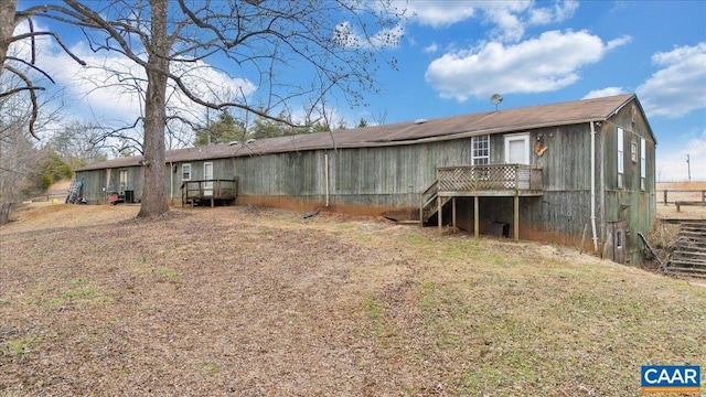 2420 James River Rd, Esmont, VA 22937 - back of house with a wooden deck, stairs, and fence